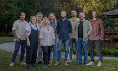 group shot of 2023 artists outside in gardens