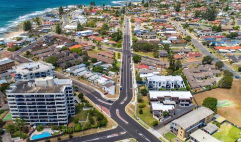 road intersection The Entrance aerial photo showing road intersection with ocean in background