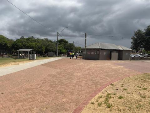 paved area in front of public toilet 