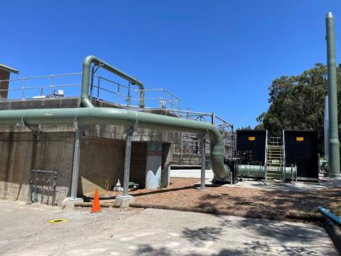Bateau Bay Sewage Treatment plant upgrade A large sewage treatment plant featuring extensive piping systems and a prominent main pipe structure.