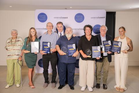 Australia Day Award winners 2025 Group of men and woman holding awards
