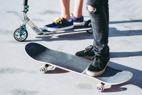 Frost Reserve Kincumber Skate Park upgrade People stand next to a skateboard and a scooter