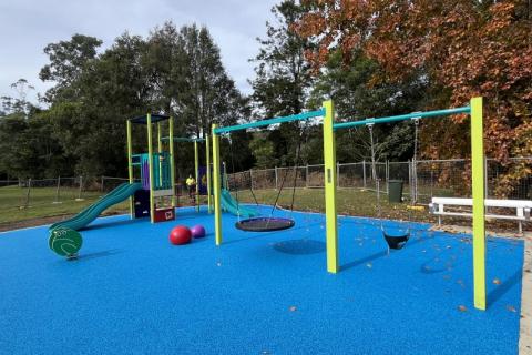 Jack Gear playspace Playspace includes a play unit with dual slides, swing set, frog springer, rubber softfall and seating.